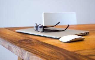 Glasses Sitting on and Wooden Table